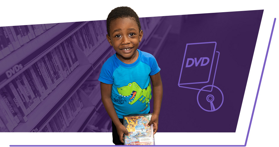 A young boy holds a DVD